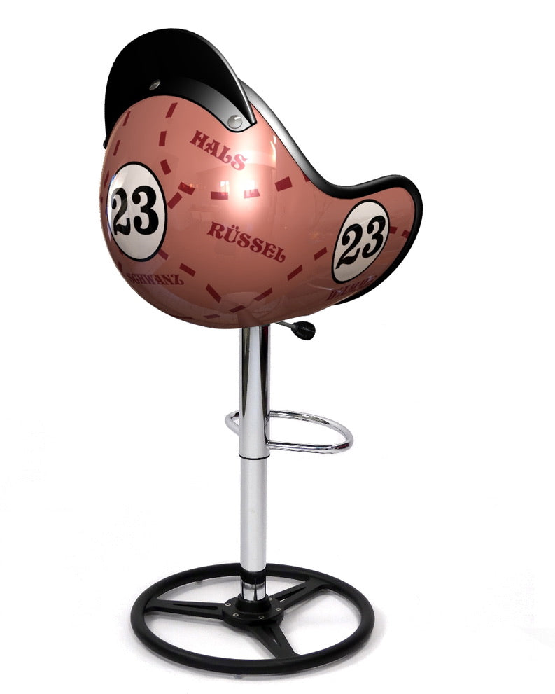 Bar chair artwork in helmet shape with Porsche 917 Pink Pig livery